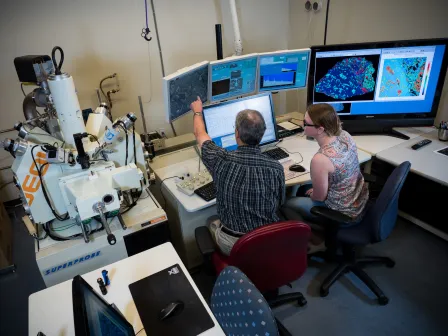 Jolliff and a student using the JEOL JXA-8200 electron microprobe