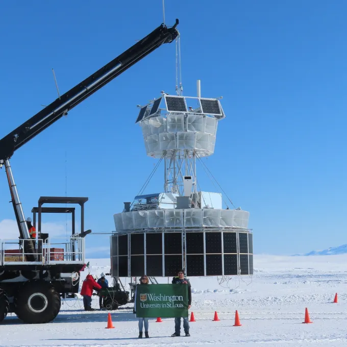Lindsey Lisalda and Richard Bose in front of PUEO prior to launch